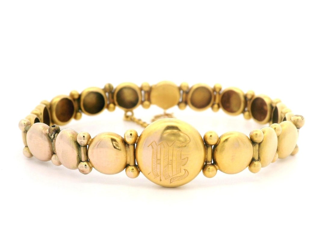 Antique Victorian 11-14k Yellow Gold Circular Link Bracelet w/ Safety Chain: Antique Victorian 11-14k Yellow Gold Circular Link Bracelet w/ Safety Chain This exquisite Antique Victorian Circular Link Bracelet is crafted from solid 11-14k yellow gold, showcasing an elegant roun