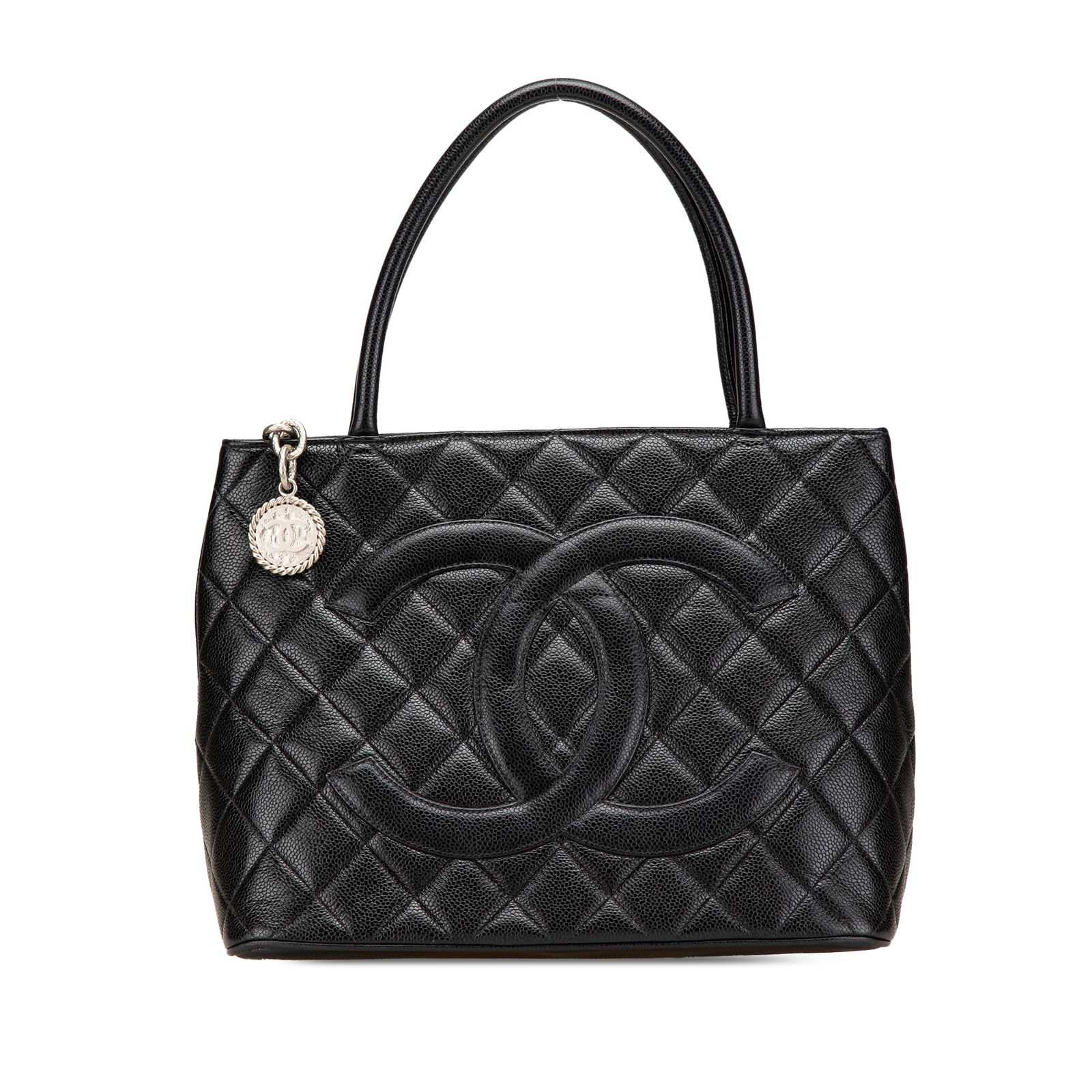Chanel Caviar Medallion Tote Black Leather Bag with Dust Bag: Chanel Caviar Medallion Tote Black Leather Bag with Dust Bag The Chanel Caviar Medallion Tote is an iconic piece crafted from luxurious quilted caviar leather. This elegant bag features rolled leather