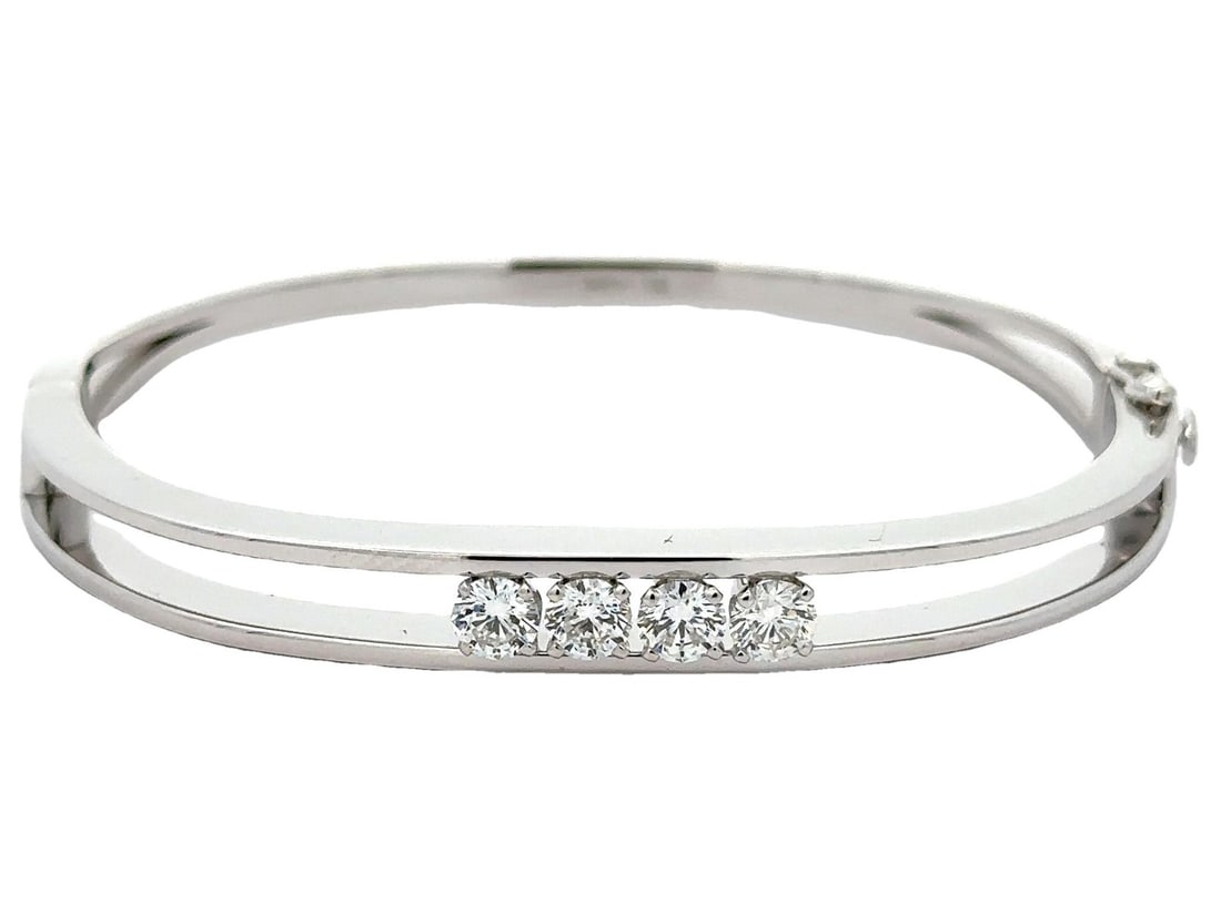 14k White Gold 1.4ct Diamond Open Hinged Stackable Bangle Bracelet: 14k White Gold 1.4ct Diamond Open Hinged Stackable Bangle Bracelet This exquisite 14k white gold bangle bracelet features a stunning arrangement of four natural genuine diamonds, each expertly crafted