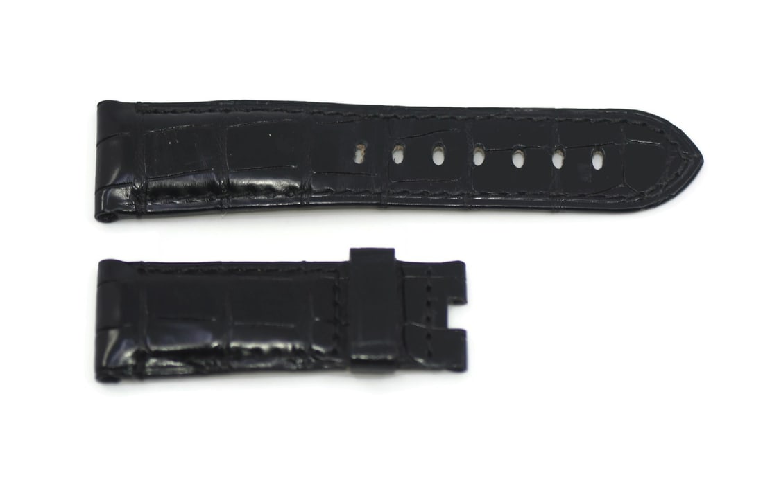 Authentic Panerai Black Leather Wristwatch Strap 24mm: Authentic Panerai Black Leather Wristwatch Strap 24mm Enhance your timepiece with this Panerai Black Leather Strap, designed for optimal comfort and style. Crafted from high-quality leather, this wris