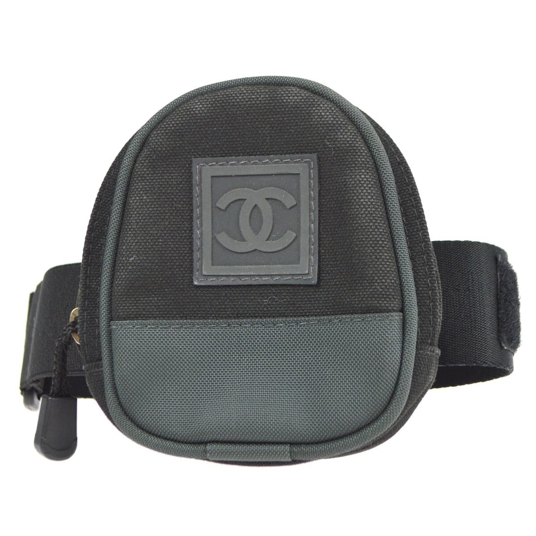 Chanel Black Sport Line Mini Leg Bag Zip Closure: Chanel Black Sport Line Mini Leg Bag Zip Closure This Chanel Black Sport Line Leg Bag is a stylish and functional accessory, perfect for those on the go. The mini-sized bag features a secure zip closu