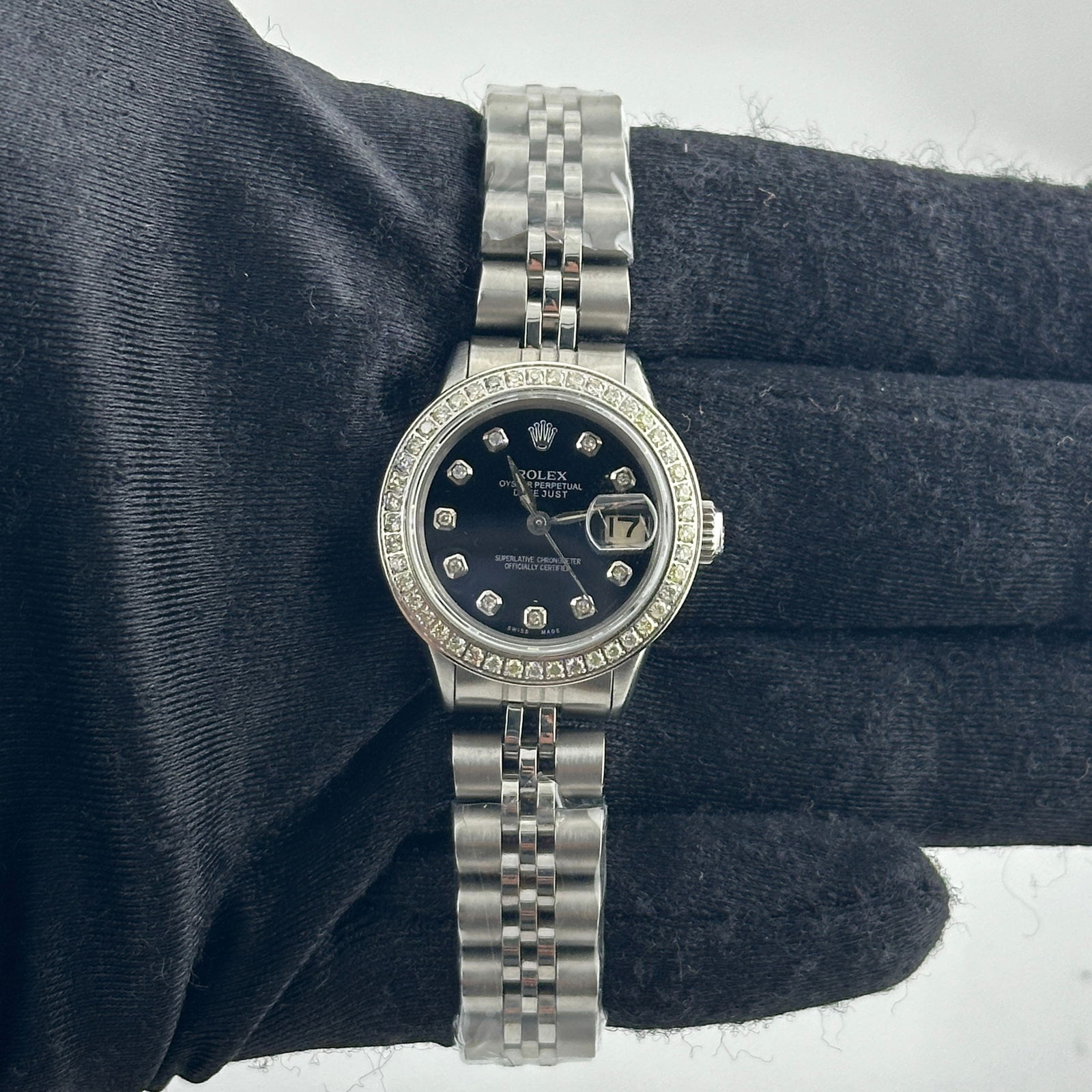 Rolex Datejust Ladies 6517 After Market Black Diamond Dial Pave Bezel Jubilee Bracelet: Rolex Datejust Ladies 6517 After Market Black Diamond Dial Pave Bezel Jubilee Bracelet This exquisite Rolex Datejust is designed for ladies and features a stunning After Market Black Diamond dial. The
