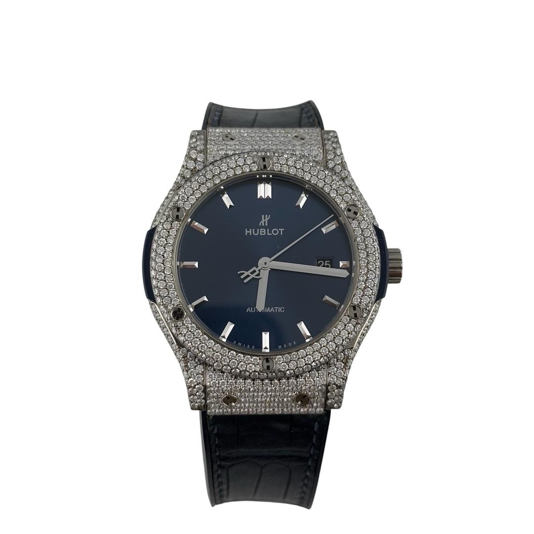 Hublot Classic Fusion Blue Dial Diamond Bezel Leather Ref 542.NX.7170.LR: Hublot Classic Fusion Blue Dial Diamond Bezel Leather Ref 542.NX.7170.LR This Hublot Classic Fusion watch features a striking blue dial complemented by a diamond bezel, making it a stunning addition t