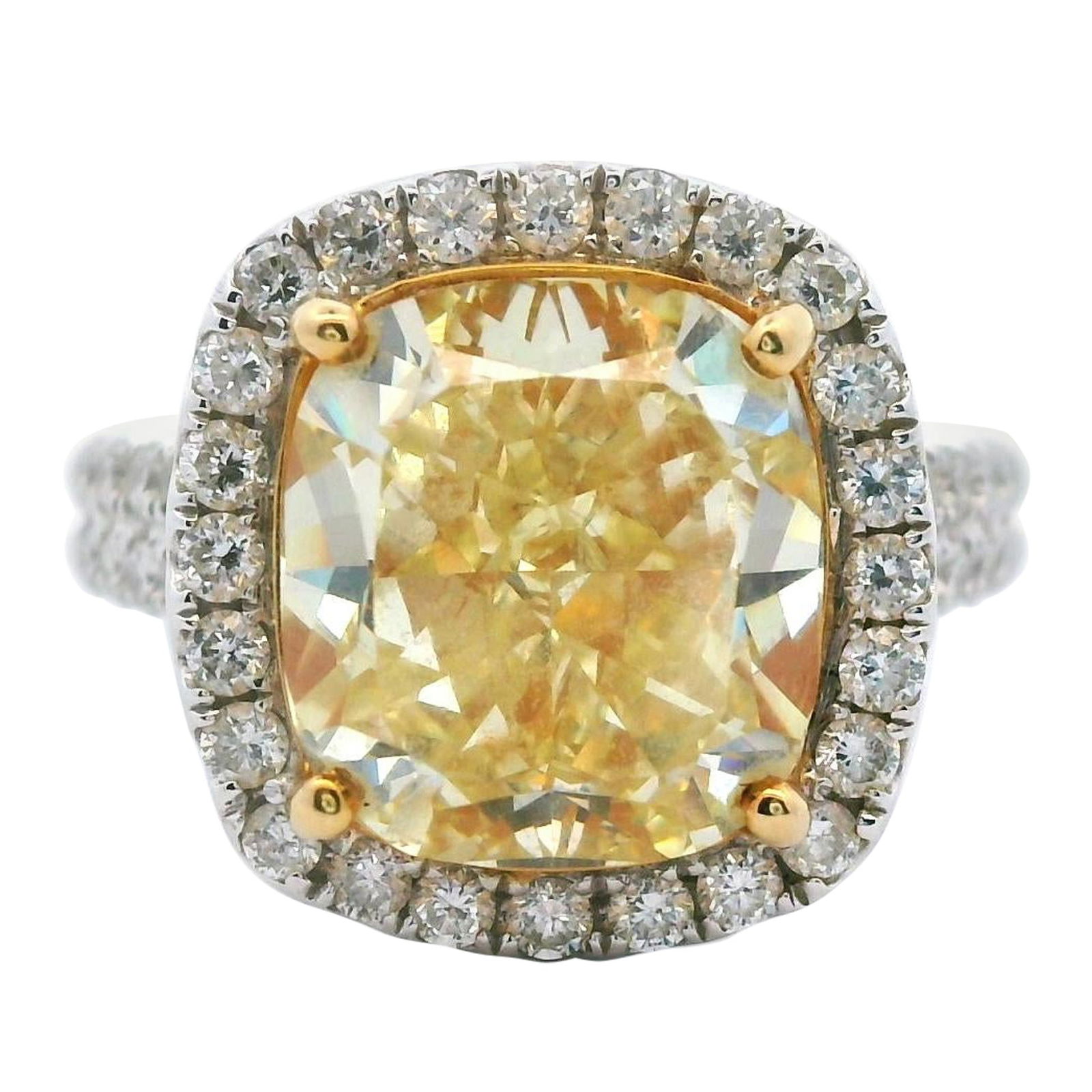 GIA 5.86ct Fancy Yellow Diamond Ring in Two-Tone 18k Gold: GIA 5.86ct Fancy Yellow Diamond Ring in Two-Tone 18k Gold This exquisite ring features a stunning GIA certified natural yellow diamond at its center, presenting a striking cushion cut with a weight of