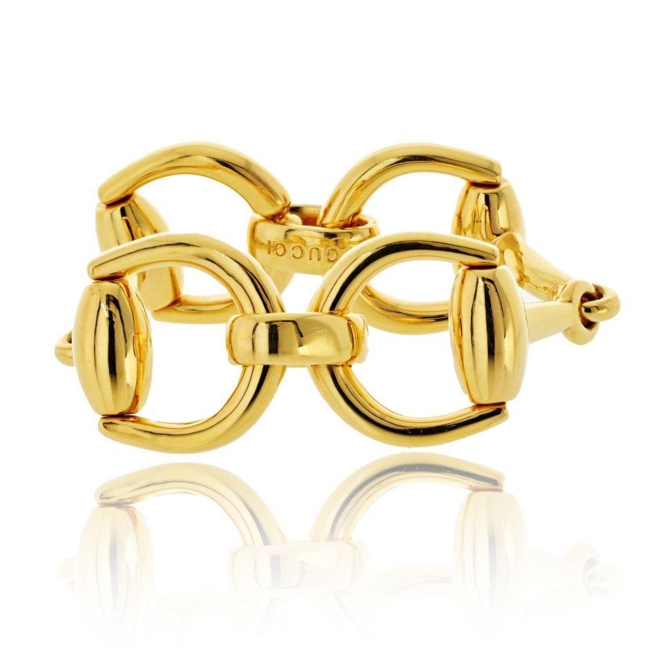 Gucci 18K Yellow Gold Horsebit Vintage Link Bracelet 8 inch: Gucci 18K Yellow Gold Horsebit Vintage Link Bracelet 8 inch Make a bold statement with this exquisite Gucci 18K Yellow Gold Horsebit Vintage Large Link Bracelet. Crafted from rich 18K yellow gold, thi