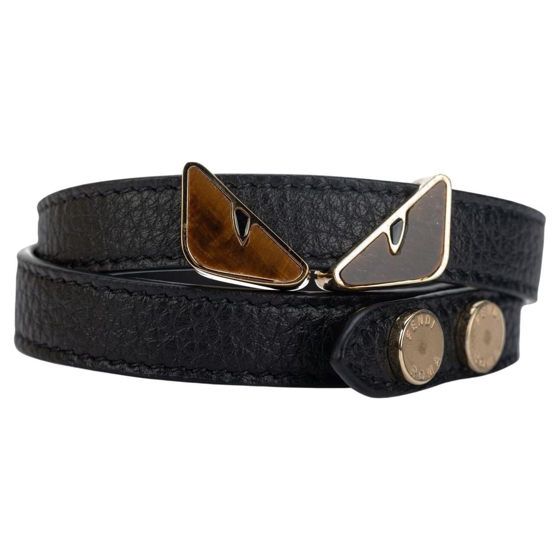 Fendi Monster Double Bracelet Tiger Eye Leather Italy 2021: Fendi Monster Double Bracelet Tiger Eye Leather Italy 2021 Elevate your accessory collection with this Fendi Monster Bracelet. Crafted in Italy from premium leather, this unique double bracelet showca