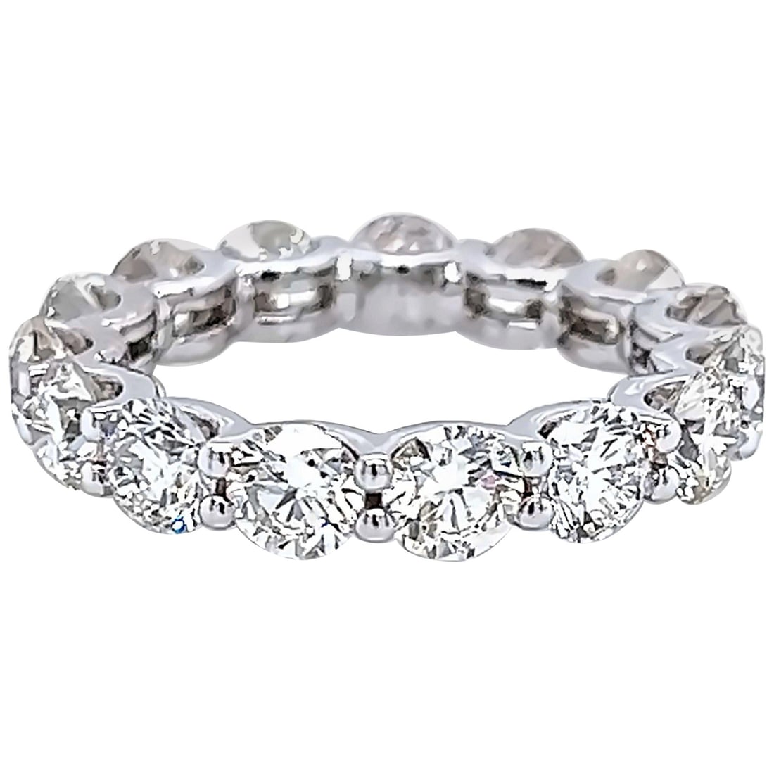 4.59ct Diamond Eternity Band 18k White Gold: 4.59ct Diamond Eternity Band 18k White Gold This stunning diamond eternity band features 15 round brilliant diamonds totaling 4.59 carats, set in luxurious 18k white gold. The band showcases a contemp