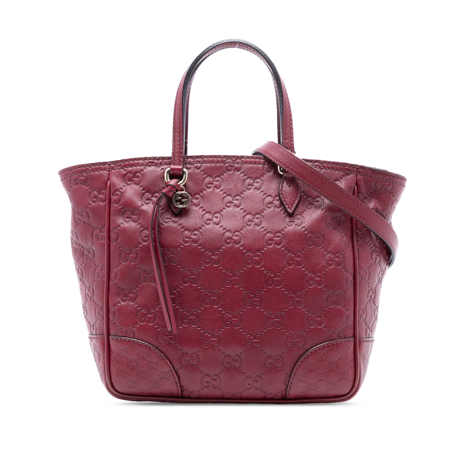 Gucci Small Guccissima Bree Satchel Red Leather Bag: Gucci Small Guccissima Bree Satchel Red Leather Bag The Small Guccissima Bree Satchel showcases a luxurious embossed leather exterior in a vibrant red hue. This stylish bag features flat leather handl