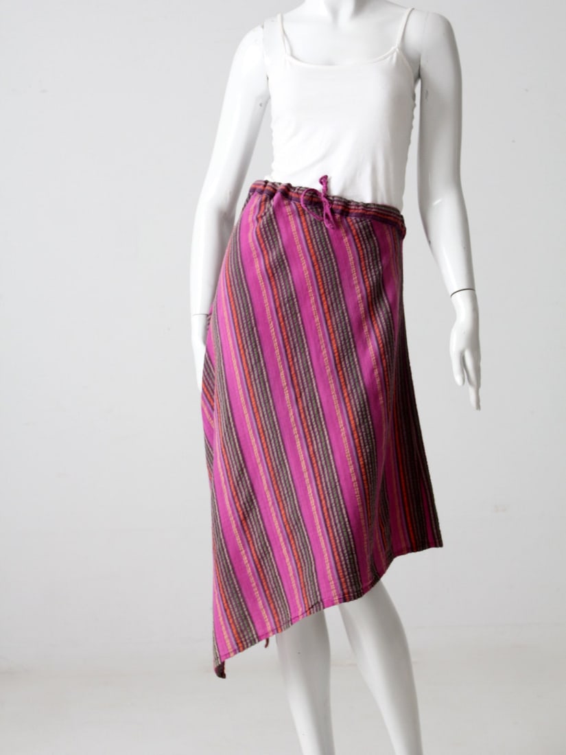 Bohemian Vintage Multi-Color Drawstring Skirt or Dress: Bohemian Vintage Multi-Color Drawstring Skirt or Dress Discover the charm of this Vintage Stripe Drawstring Skirt, crafted from multi-colored cotton. This unique skirt features an asymmetrical cut wit