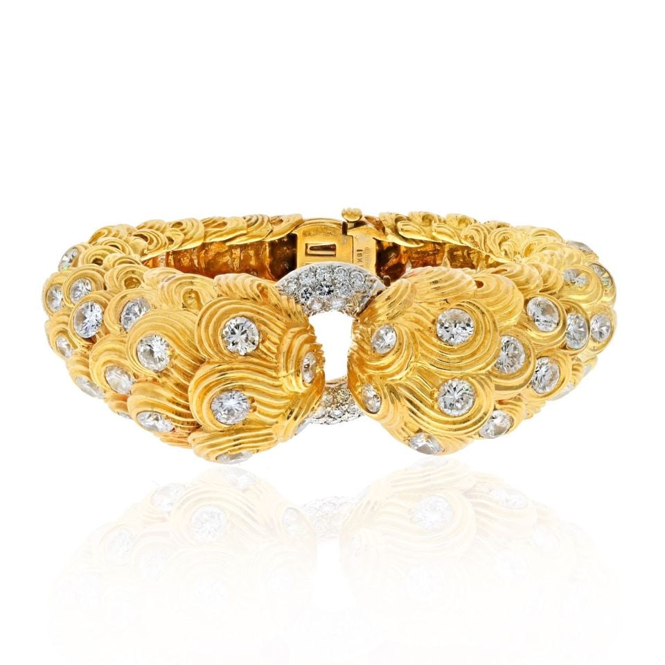 David Webb 21 Carat Diamond Textured Bracelet in Platinum and 18K Gold: David Webb 21 Carat Diamond Textured Bracelet in Platinum and 18K Gold This exquisite David Webb bracelet features a stunning combination of platinum and 18K yellow gold, showcasing a unique scroll de