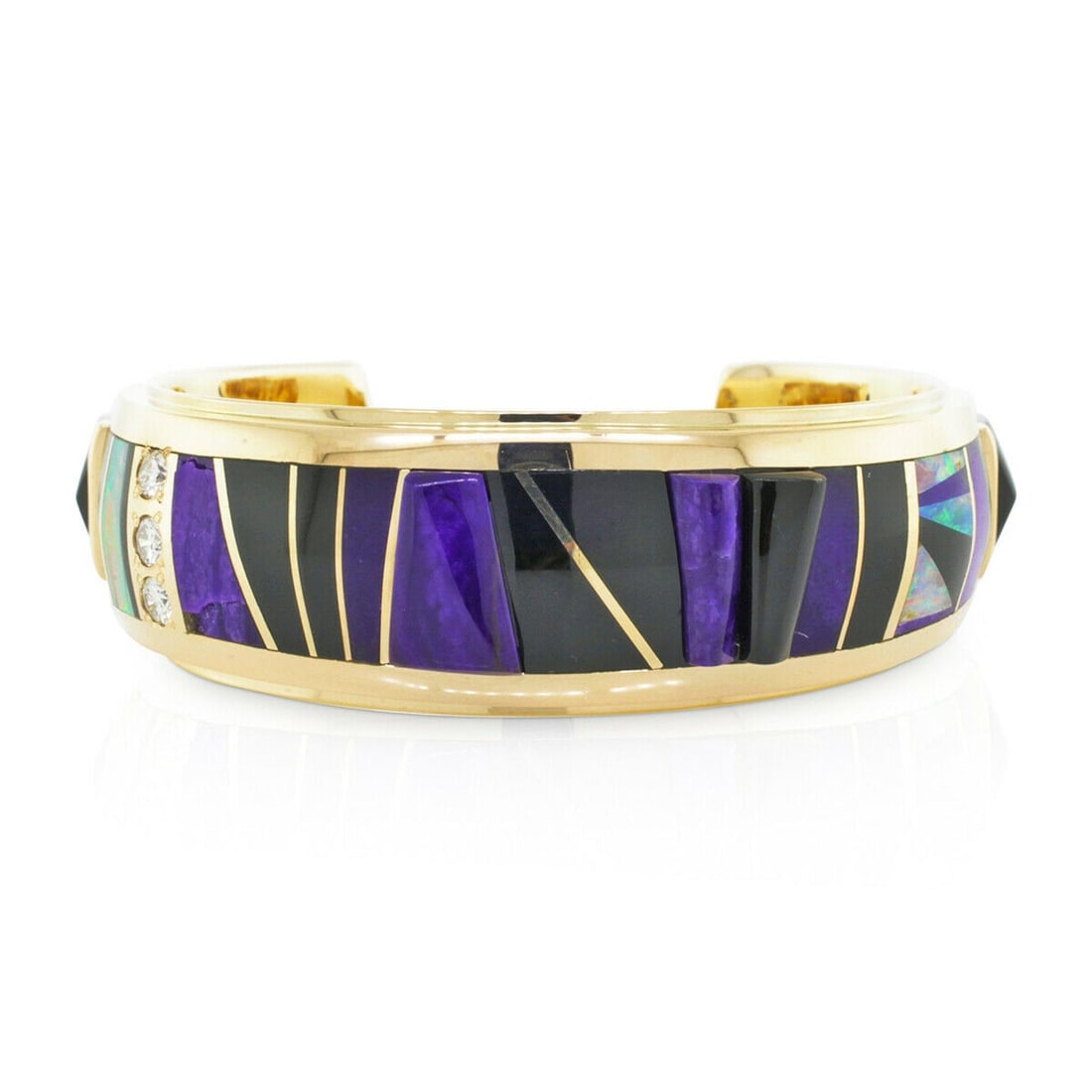 Ray Tracey 14K Yellow Gold Black Jade Fire Opal Diamond Cuff Bracelet: Ray Tracey 14K Yellow Gold Black Jade Fire Opal Diamond Cuff Bracelet This stunning cuff bracelet showcases a harmonious blend of 14K yellow gold, black jade, fire opal, and diamonds. Handcrafted with