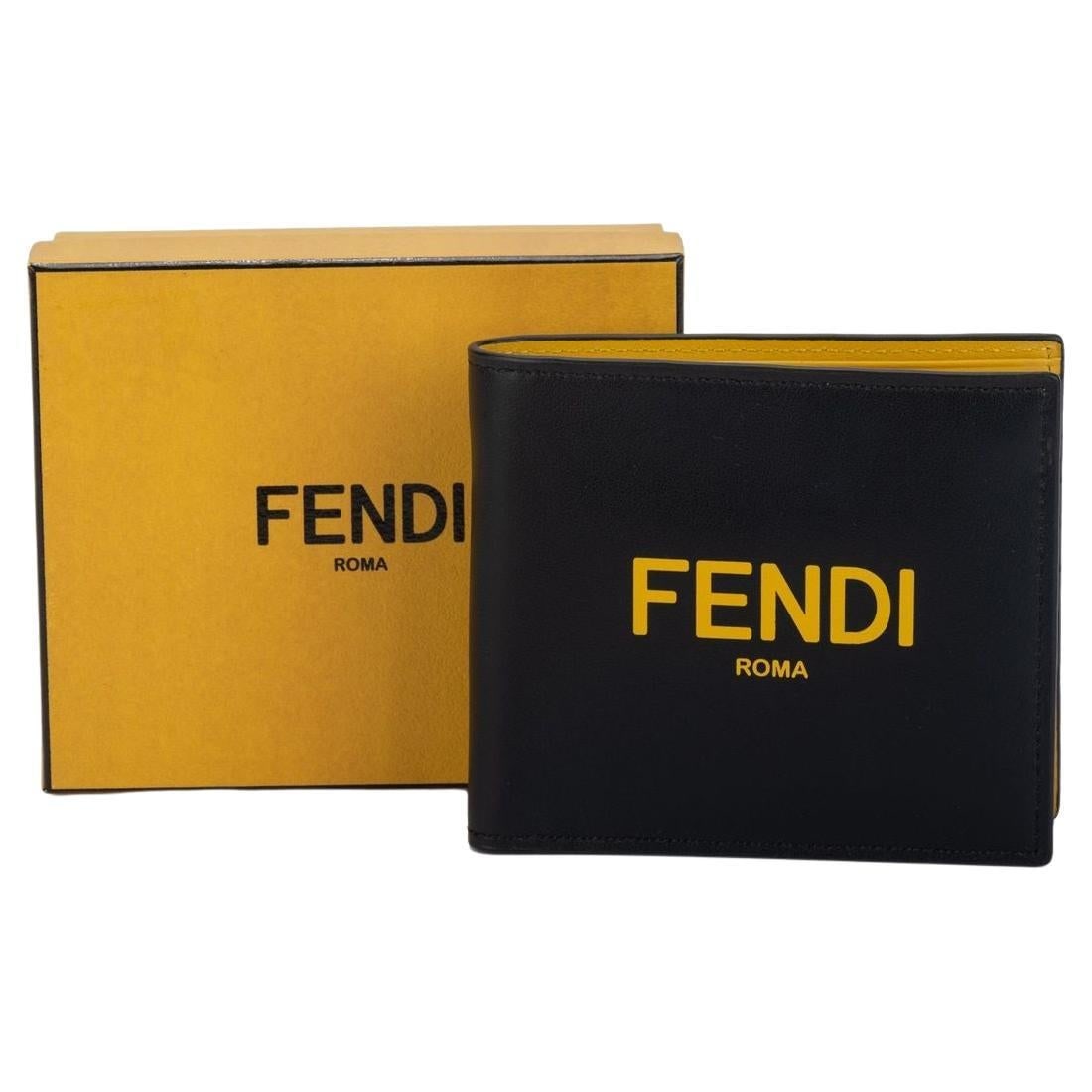 Fendi Black Yellow Bifold Wallet Leather New with Box: Fendi Black Yellow Bifold Wallet Leather New with Box This exquisite Fendi bifold wallet showcases a stylish combination of black and yellow. Crafted from high-quality leather, the exterior features a