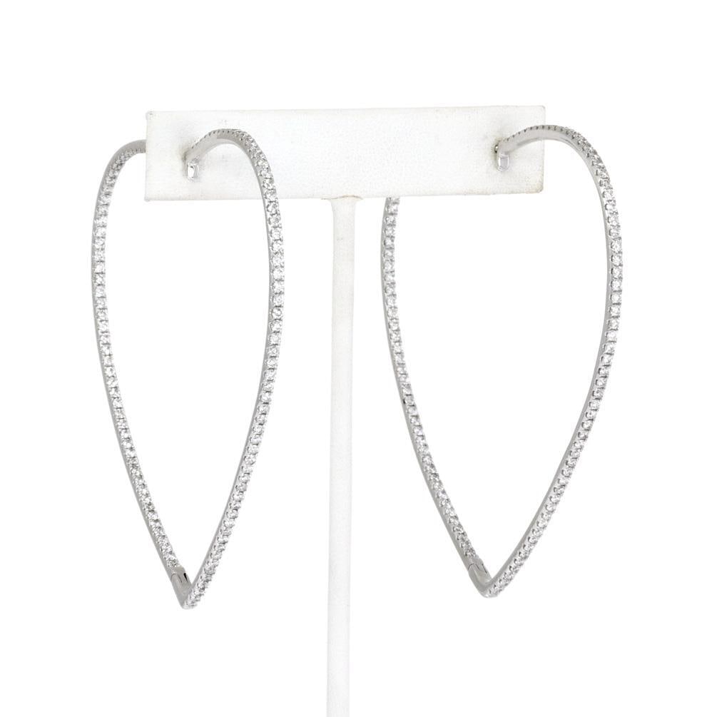 Extra Large 18k White Gold Heart Diamond Hoop Earrings 5ct: Extra Large 18k White Gold Heart Diamond Hoop Earrings 5ct Introducing a stunning pair of Extra Large Inside Out Diamond Hoop Earrings, elegantly crafted from 18k white gold with a polished finish. Th
