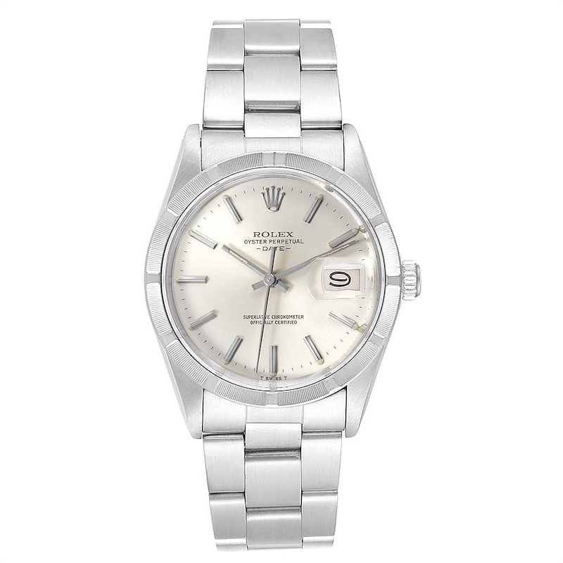 Rolex Date 15010 Silver Dial Engine Turned Bezel Oyster Bracelet: Rolex Date 15010 Silver Dial Engine Turned Bezel Oyster Bracelet This Rolex Date watch features a stunning silver dial that beautifully contrasts with its engine-turned bezel. Designed for both men an