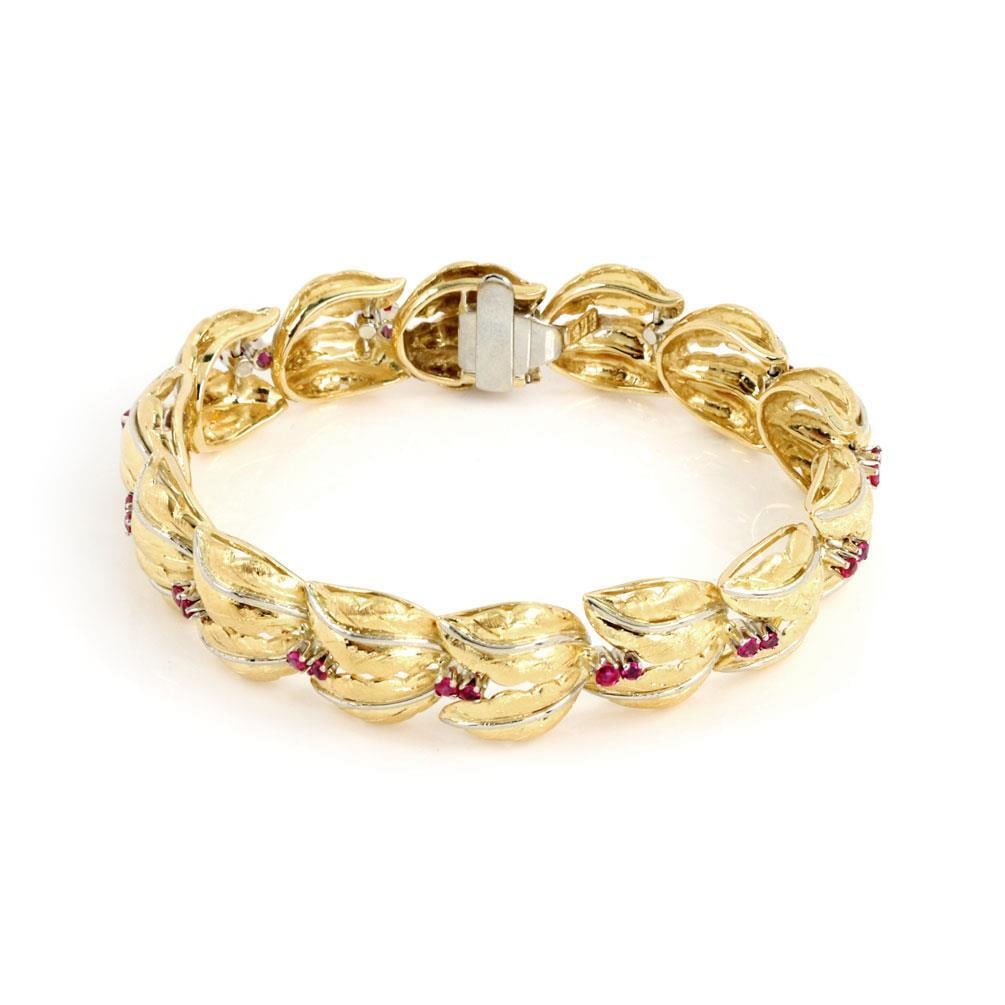 Spritzer & Furman 1.00ct Ruby 18k Yellow Gold Leaf Bracelet: Spritzer & Furman 1.00ct Ruby 18k Yellow Gold Leaf Bracelet This exquisite bracelet features a stunning design crafted from authentic 18k yellow gold with a polished finish. The bracelet showcases ele