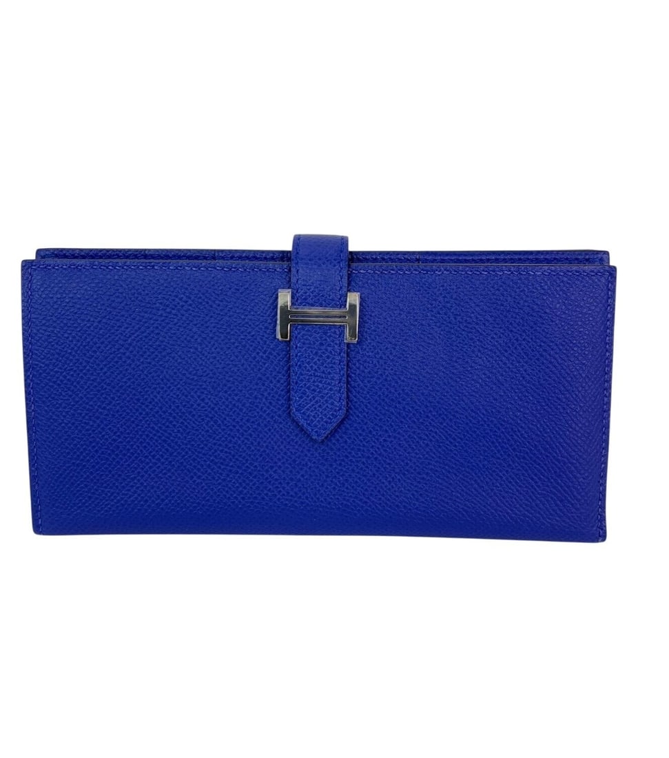 Hermes Long Bearn Gusset Wallet Electrique Bleu Leather Designer: Hermes Long Bearn Gusset Wallet Electrique Bleu Leather Designer This exquisite Hermes Long Epson Bearn Gusset Wallet in Electrique Bleu is a stunning accessory for any fashion enthusiast. Crafted fro