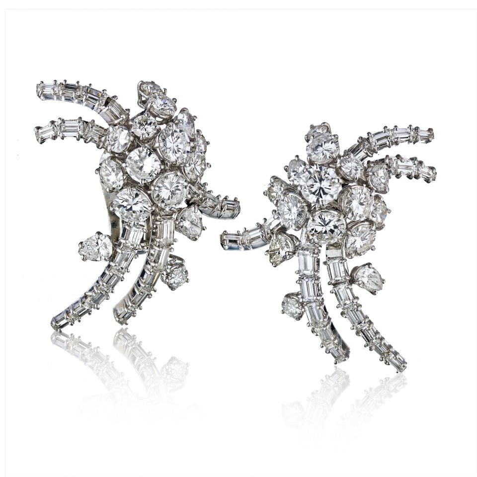 French Platinum 1960s Estate Earrings with 12 Carat Diamonds: French Platinum 1960s Estate Earrings with 12 Carat Diamonds These exquisite estate earrings from the 1960s exemplify French elegance and craftsmanship. Handcrafted in platinum, they feature a stunnin