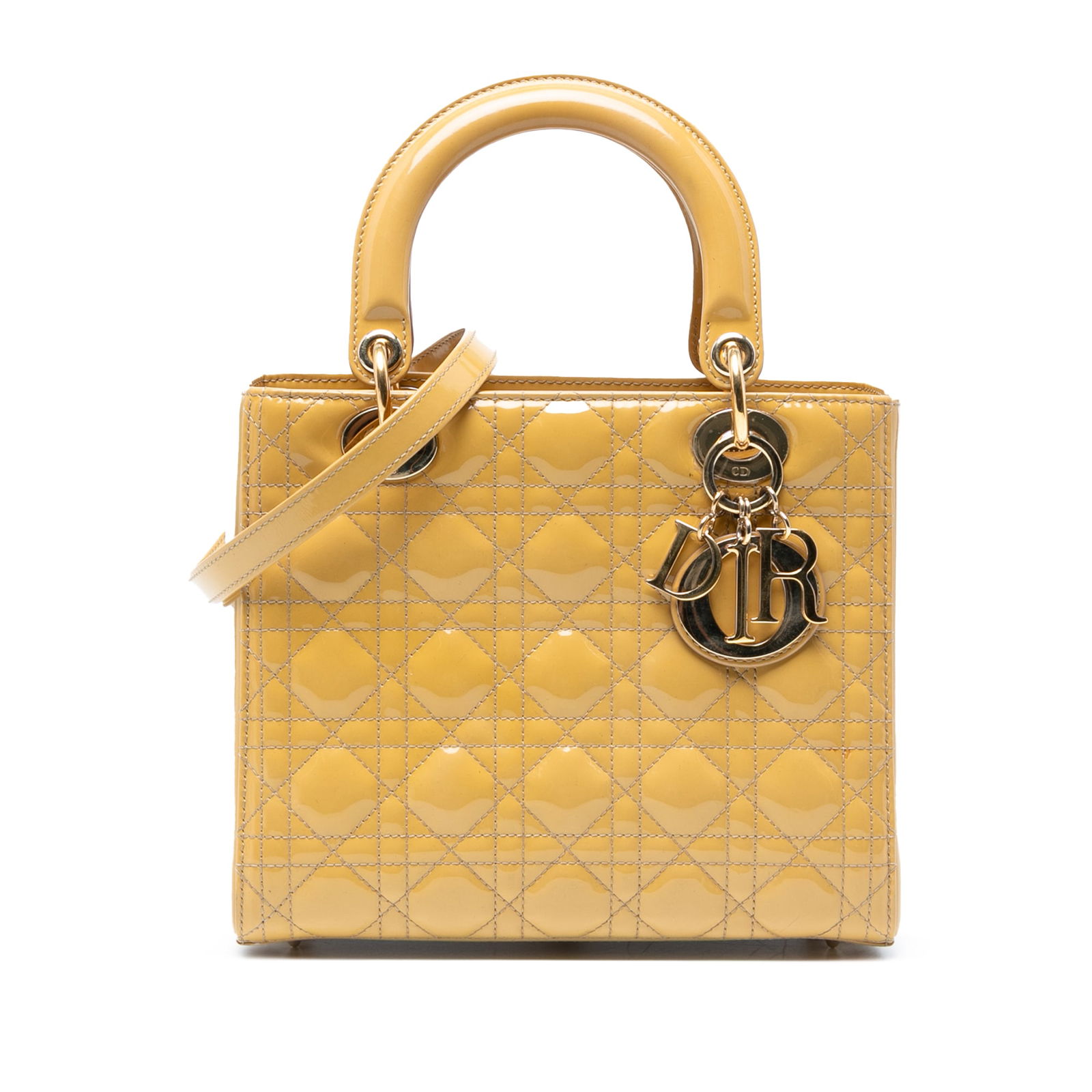 Dior Medium Patent Cannage Lady Dior Yellow Leather Bag: Dior Medium Patent Cannage Lady Dior Yellow Leather Bag The Medium Patent Cannage Lady Dior bag showcases a luxurious quilted patent leather exterior in an eye-catching yellow hue. It features flat le