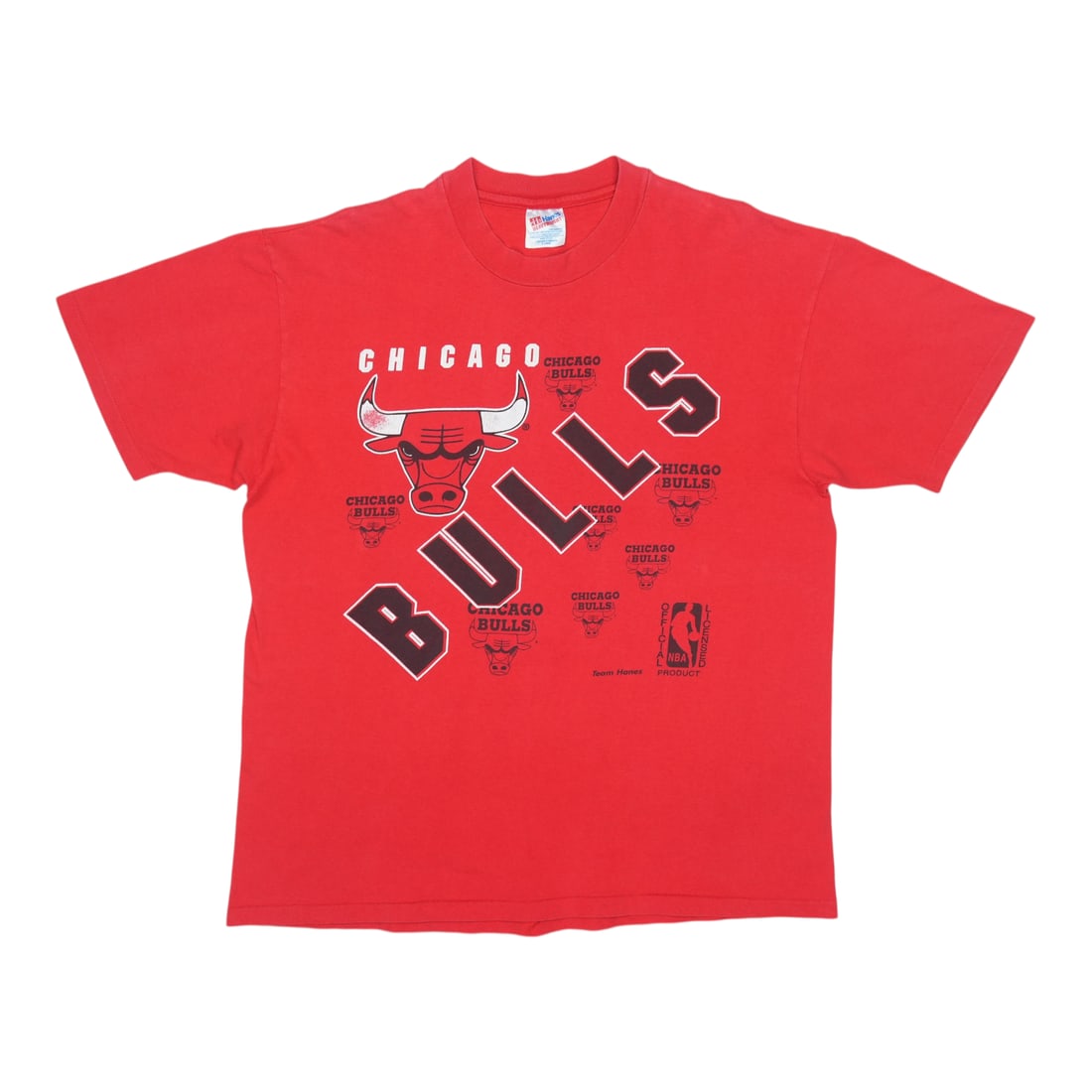 Vintage 1990s Chicago Bulls Red Cotton Shirt XL: Vintage 1990s Chicago Bulls Red Cotton Shirt XL This original vintage 1990s Chicago Bulls shirt is a must-have for any fan. Crafted from 100% cotton, it features a classic red color with no back graph