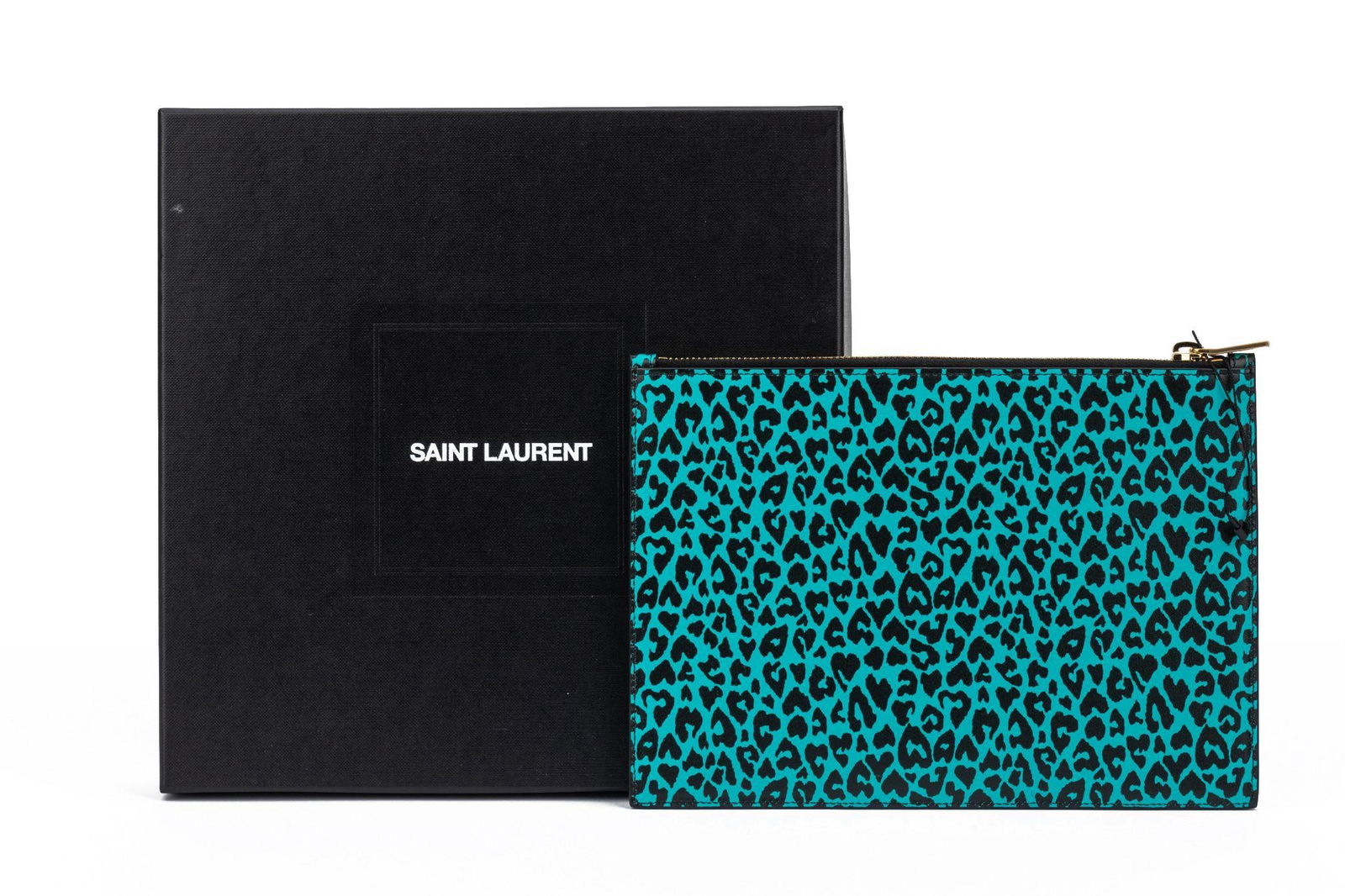 Yves Saint Laurent Cheetah Turquoise Leather Pouch with Gold Logo: Yves Saint Laurent Cheetah Turquoise Leather Pouch with Gold Logo This Yves Saint Laurent pouch is crafted from smooth calfskin leather featuring a striking leopard/heart pattern. The iconic Saint Lau