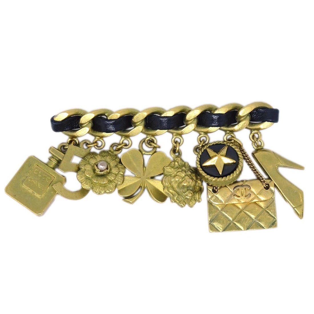 Chanel Clover Brooch Pin Gold-Plated Icon No5 95P: Chanel Clover Brooch Pin Gold-Plated Icon No5 95P Elevate your accessory collection with this stunning Chanel Icon Brooch Pin, featuring a charming clover design. This exquisite piece is gold-plated,