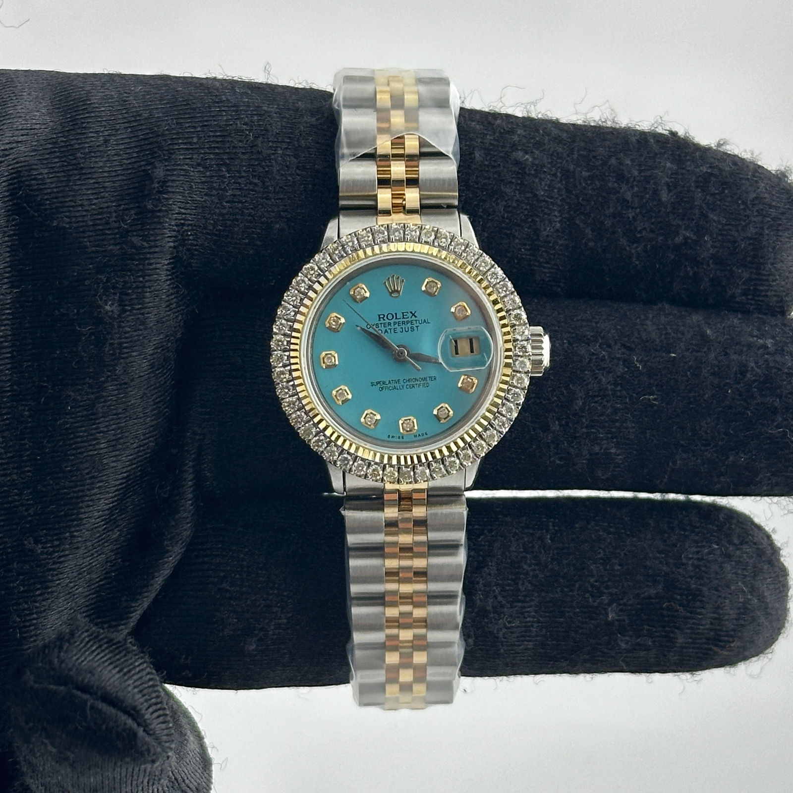 Rolex Datejust 26mm Tiffany Diamond Dial Jubilee Ref 6524: Rolex Datejust 26mm Tiffany Diamond Dial Jubilee Ref 6524 This elegant Rolex Datejust timepiece is designed for ladies and features a stunning Aftermarket Tiffany Diamond dial. The watch is part of th
