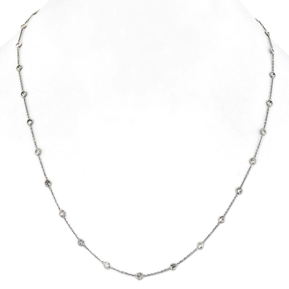 Platinum 1.96ct Diamonds By The Yard Necklace with Mini Bezels: Platinum 1.96ct Diamonds By The Yard Necklace with Mini Bezels This exquisite Diamonds By The Yard necklace features a total of 1.96 carats of round diamonds, meticulously set in high-quality