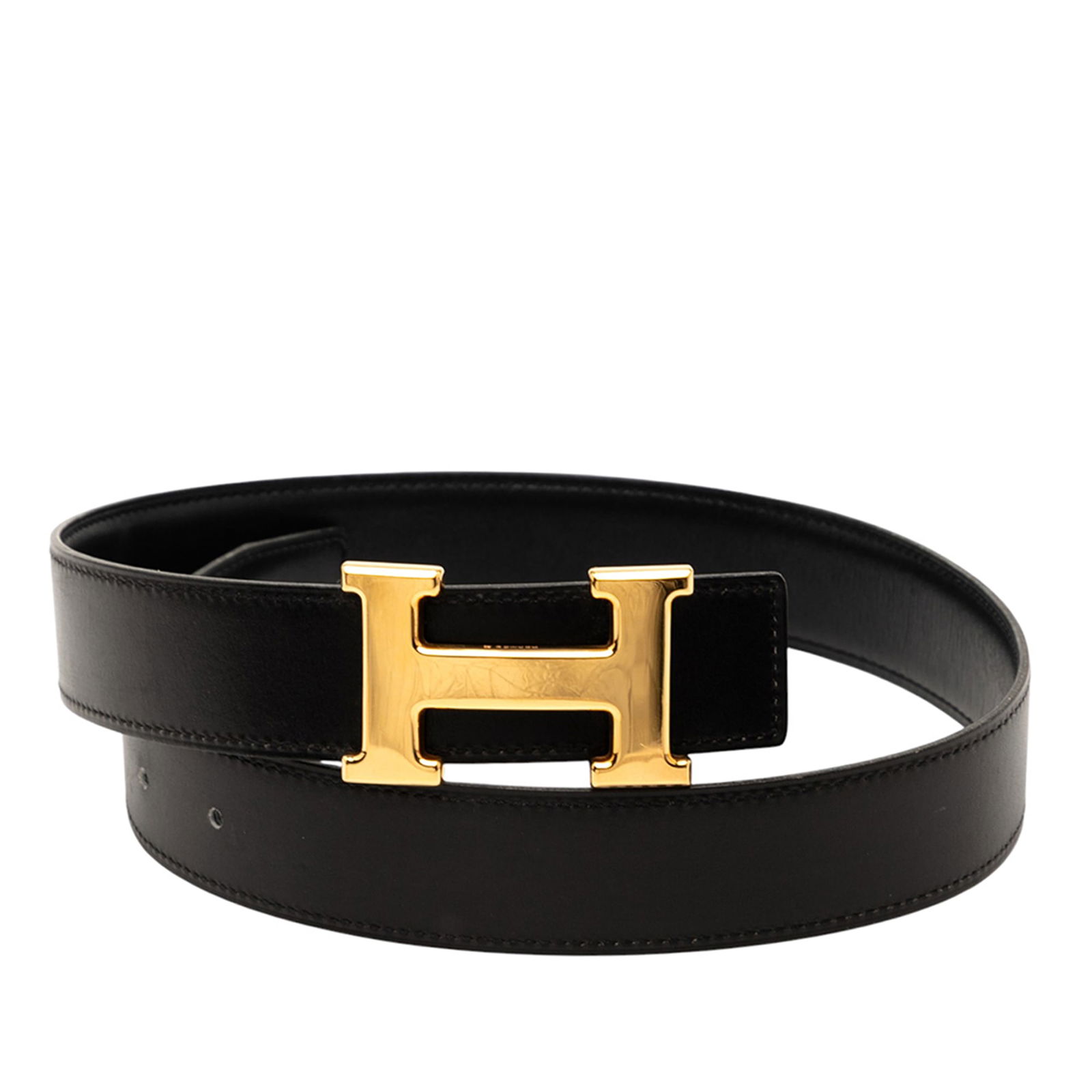 Hermes Box Calf Constance Black Leather Belt: Hermes Box Calf Constance Black Leather Belt The Hermes Box Calf Constance Belt is an elegant accessory crafted from premium Box Calf leather in a classic black hue. It features a distinctive H