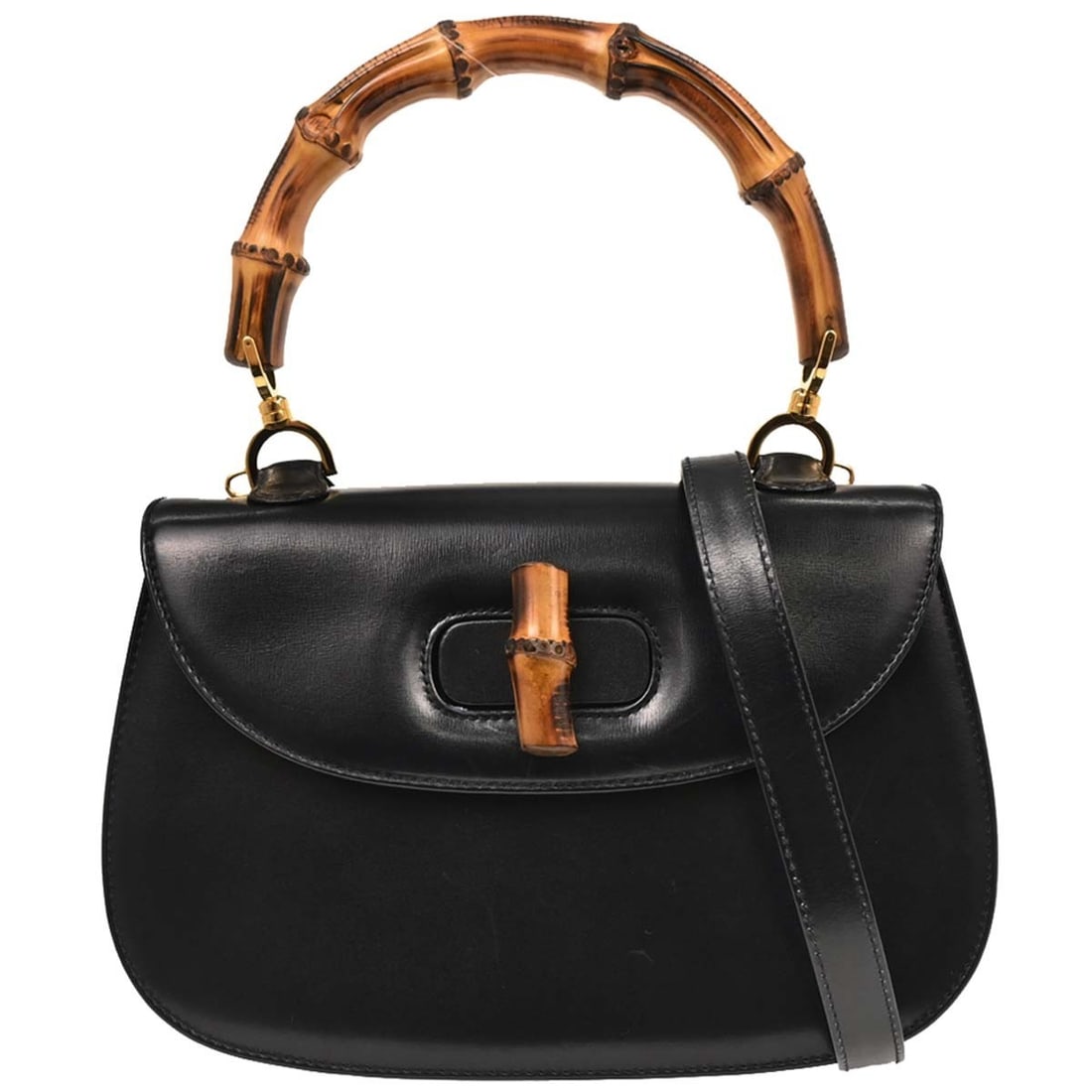 Gucci Black Bamboo 2way Top Handle Handbag 000.2046.0633: Gucci Black Bamboo 2way Top Handle Handbag 000.2046.0633 This Gucci Black Bamboo 2-way Handbag is a stylish accessory perfect for casual occasions. Crafted from high-quality leather, it features a chi