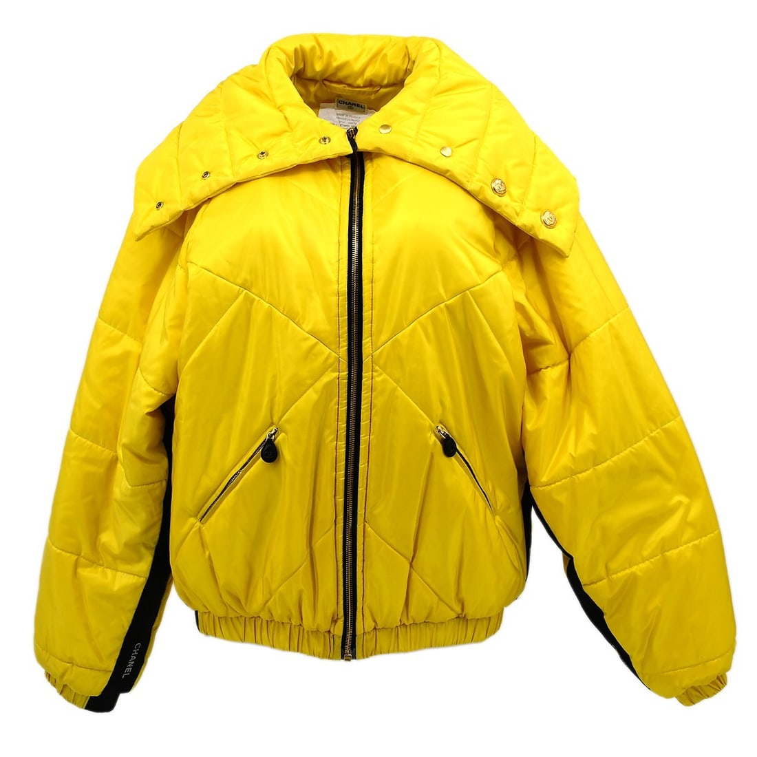 Chanel Vintage Yellow Silk Jacket with Logo Zipper #40: Chanel Vintage Yellow Silk Jacket with Logo Zipper #40 Elevate your wardrobe with this stunning Chanel mid-length jacket in a vibrant yellow hue. Crafted from 100% silk, this jacket features a zip clo