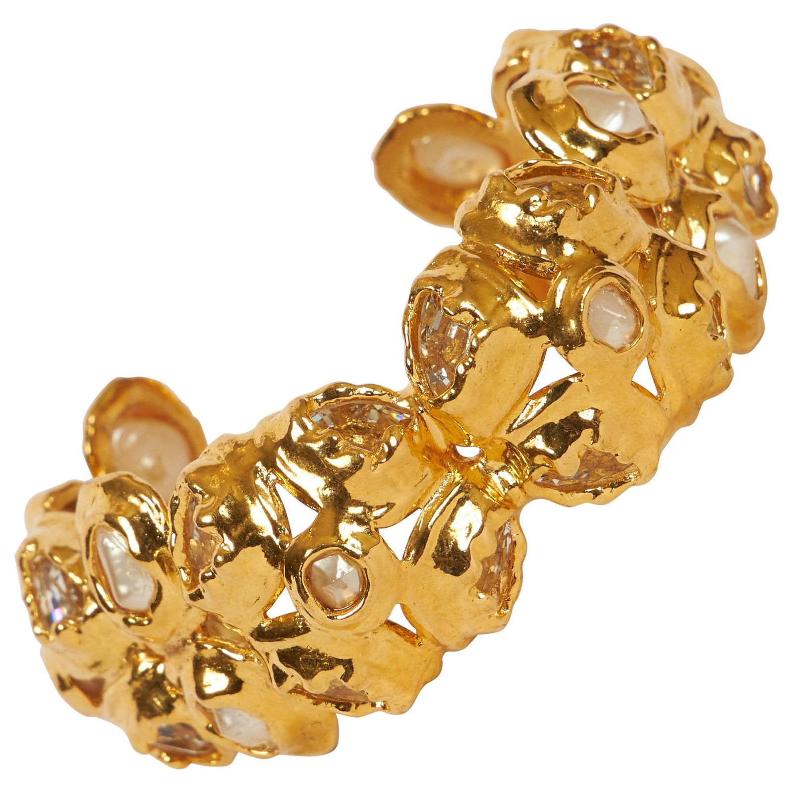 Vintage Chanel 1985 Textured Gold Faux Pearl Cuff Bracelet: Vintage Chanel 1985 Textured Gold Faux Pearl Cuff Bracelet This stunning cuff bracelet from Chanel showcases a textured gold tone metal design adorned with elegant faux pearls, embodying the essence o