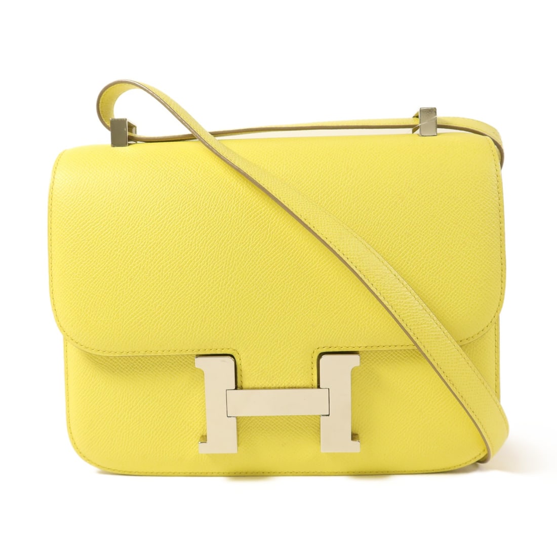 HERMES Constance 24 Shoulder Bag Epsom Leather Yellow PHW: HERMES Constance 24 Shoulder Bag Epsom Leather Yellow PHW This stunning HERMES Constance 24 Shoulder Bag is crafted from high-quality Epsom leather, featuring a vibrant lime yellow exterior that exude