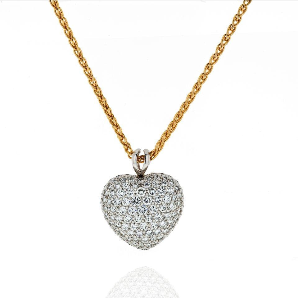 Kurt Wayne Platinum 18K Gold 5.5ct Pave Diamond Heart Pendant: Kurt Wayne Platinum 18K Gold 5.5ct Pave Diamond Heart Pendant This stunning heart pendant features a luxurious combination of platinum and 18K yellow gold, elegantly showcasing a total of 5.50 carats