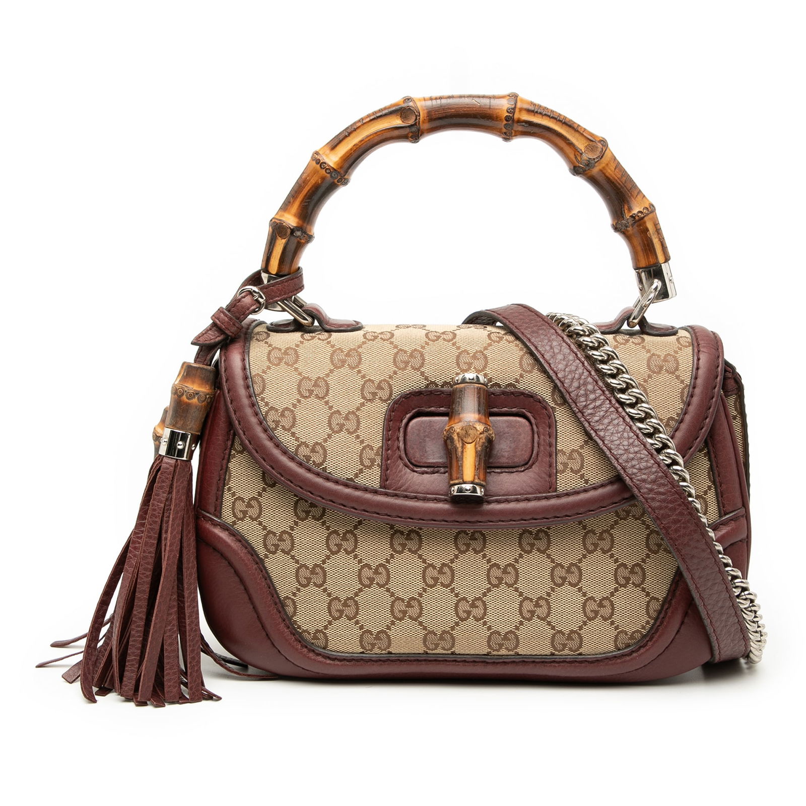 Gucci Medium GG Canvas Bamboo Top Handle Satchel Bag: Gucci Medium GG Canvas Bamboo Top Handle Satchel Bag The Gucci Medium GG Canvas New Bamboo Top Handle Bag is a sophisticated satchel crafted from durable canvas with elegant leather trim. It features