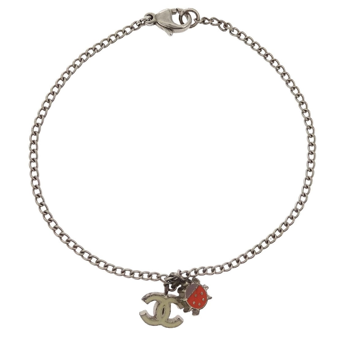 Chanel CC Ladybug Silver Plated Chain Bracelet 04P: Chanel CC Ladybug Silver Plated Chain Bracelet 04P This exquisite Chanel CC Ladybug Chain Bracelet features a stylish chain design adorned with the iconic CC logo, embodying the essence of luxury. Cra
