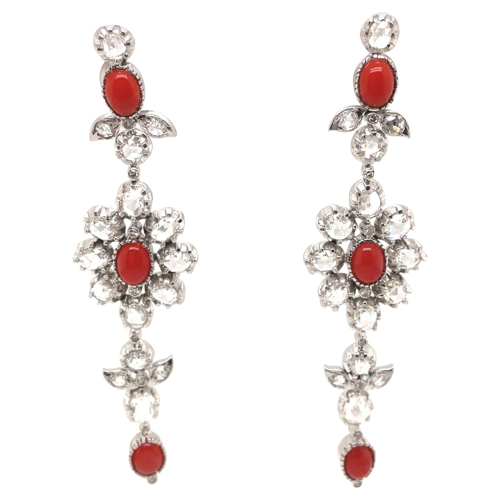 4.54ct Rose Cut Diamond Coral Chandelier Earrings 18k White Gold: 4.54ct Rose Cut Diamond Coral Chandelier Earrings 18k White Gold These stunning chandelier earrings feature a harmonious blend of 4.54 carats of rose cut diamonds and vibrant coral, set in luxurious 1
