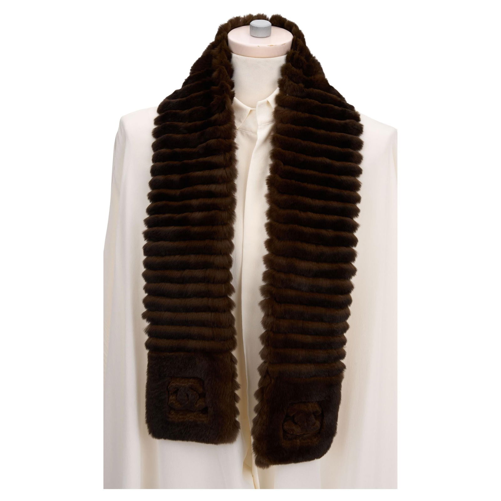 Chanel Brown Orylag Rabbit Fur Scarf with CC Logos: Chanel Brown Orylag Rabbit Fur Scarf with CC Logos Elevate your accessory collection with this exquisite Chanel scarf, crafted from a luxurious blend of 70% Orylag rabbit fur and 30% cashmere for ulti