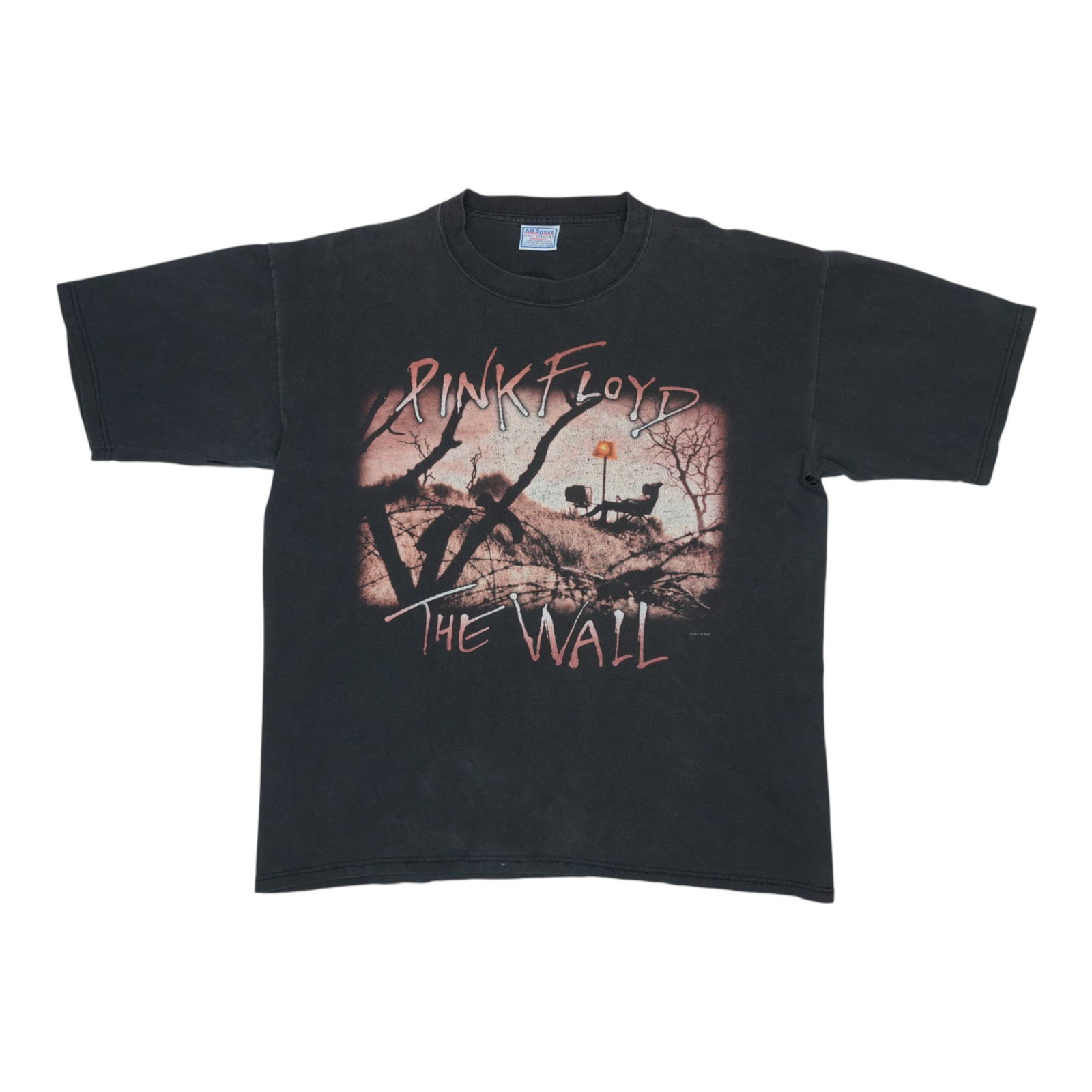 Vintage 2001 Pink Floyd The Wall Black Cotton Shirt: Vintage 2001 Pink Floyd The Wall Black Cotton Shirt This original vintage 2001 Pink Floyd The Wall shirt is a must-have for fans and collectors alike. Crafted from 100% cotton, this black shirt featur