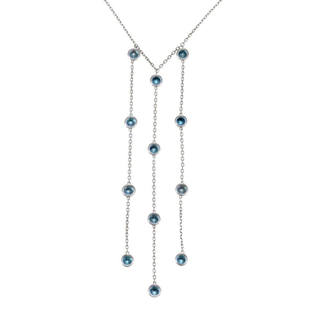 Gucci 18k White Gold Blue Topaz Dangle Pendant Necklace: Gucci 18k White Gold Blue Topaz Dangle Pendant Necklace This exquisite necklace from Gucci showcases a stunning design crafted from 18k white gold with a polished finish. It features three long strand