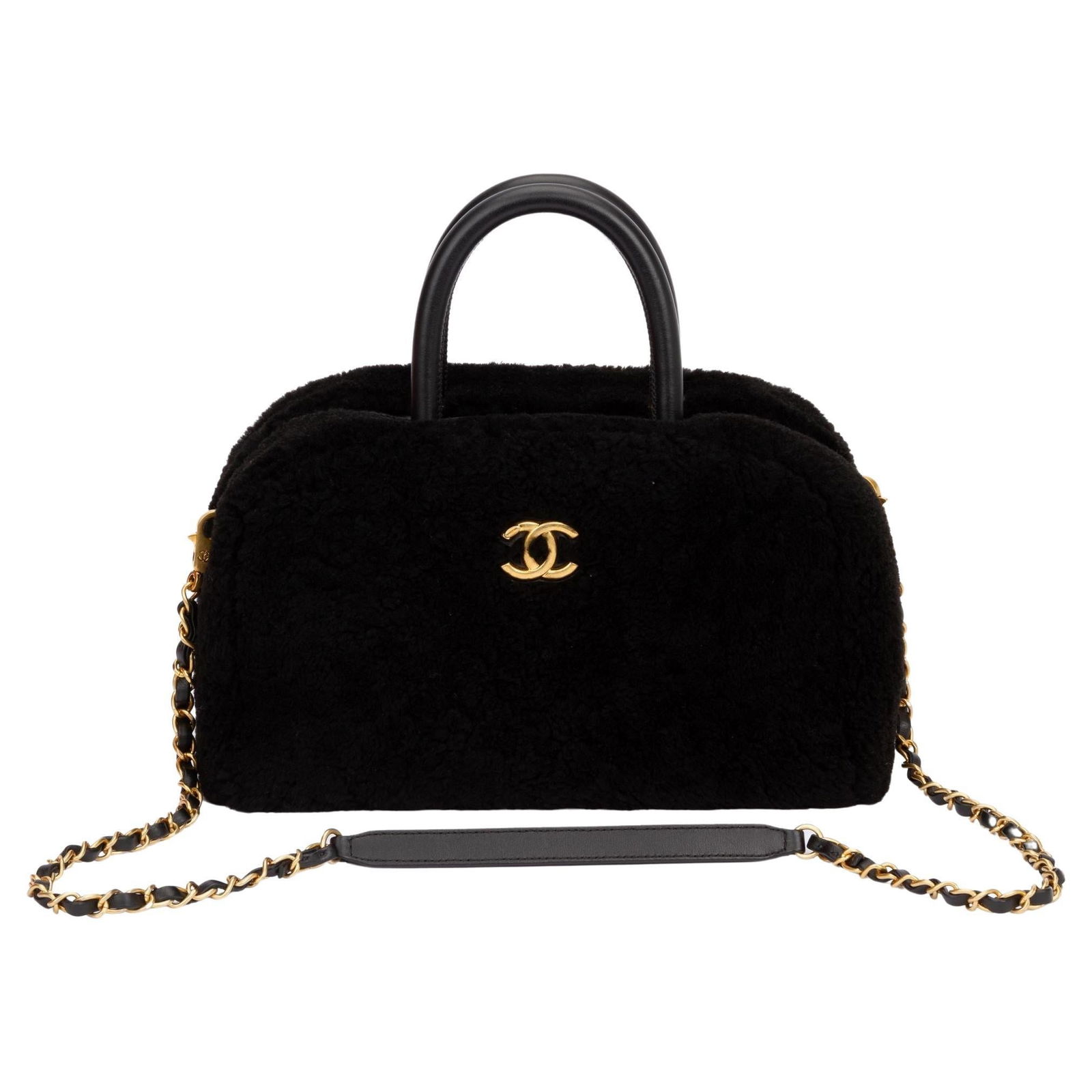 Chanel Black Shearling Bowler Bag Collection 23 with Detachable Strap: Chanel Black Shearling Bowler Bag Collection 23 with Detachable Strap This exquisite Chanel Black Shearling Bowler Bag is a must-have for any luxury handbag collector. Crafted in Italy, this stylish b