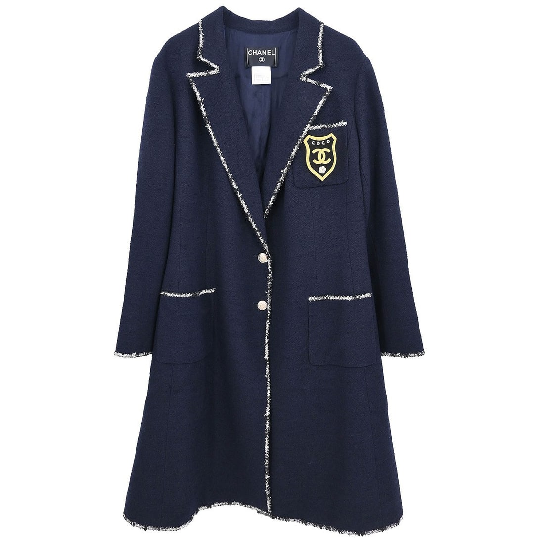 Chanel Navy Wool Blend Long Sleeve Coat 05C #46: Chanel Navy Wool Blend Long Sleeve Coat 05C #46 This vintage Chanel jacket is a sophisticated addition to your wardrobe, crafted from a premium blend of 82% wool, 10% cotton, and 8% nylon for warmth a
