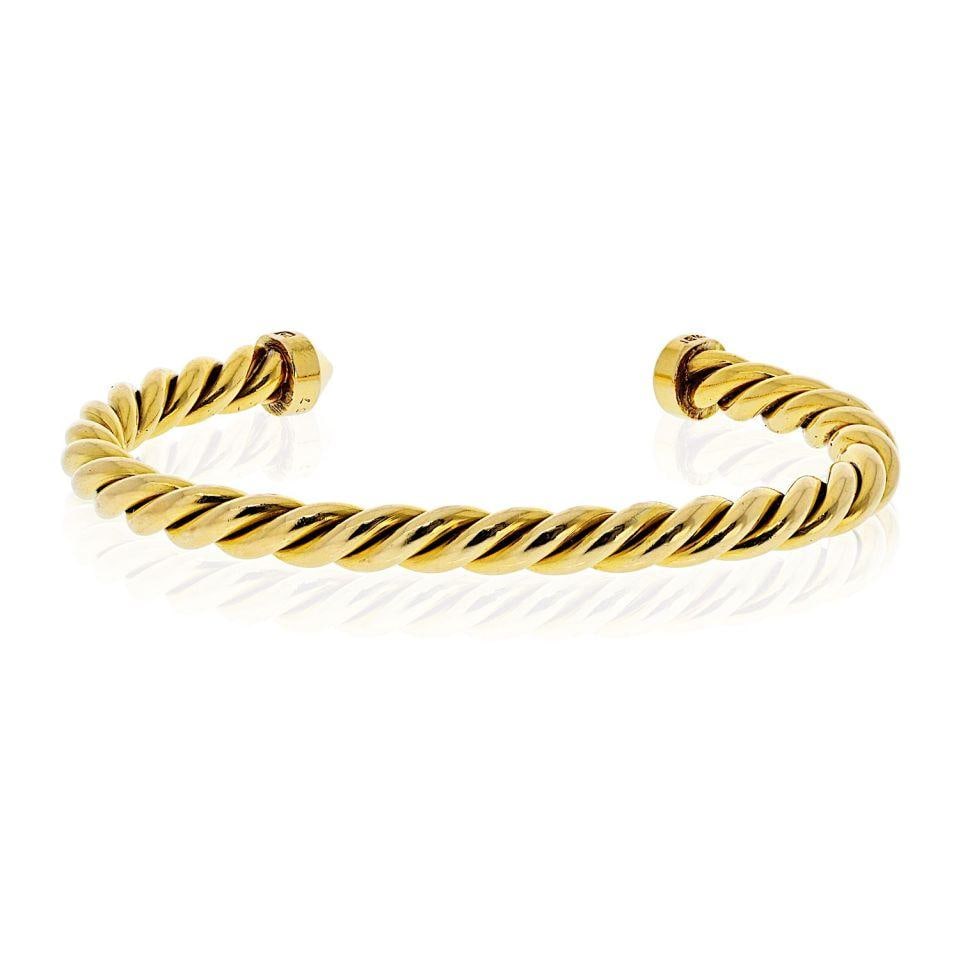 Cartier 18K Yellow Gold Twisted Cuff Bangle Bracelet Size 16: Cartier 18K Yellow Gold Twisted Cuff Bangle Bracelet Size 16 Elevate your accessory collection with this stunning Cartier 18K Yellow Gold Twisted Cuff Bangle Bracelet. Boasting a unique and bold sculp