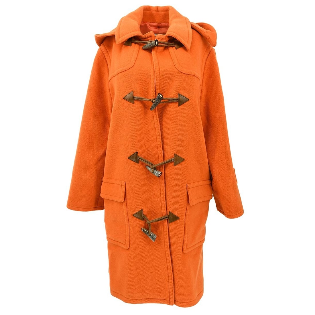 Vintage Hermes Orange Wool Duffel Coat Size 46 with Hood: Vintage Hermes Orange Wool Duffel Coat Size 46 with Hood This vintage Hermes duffel coat in a vibrant orange is crafted from 100% wool, ensuring warmth and comfort during winter. It features a long co