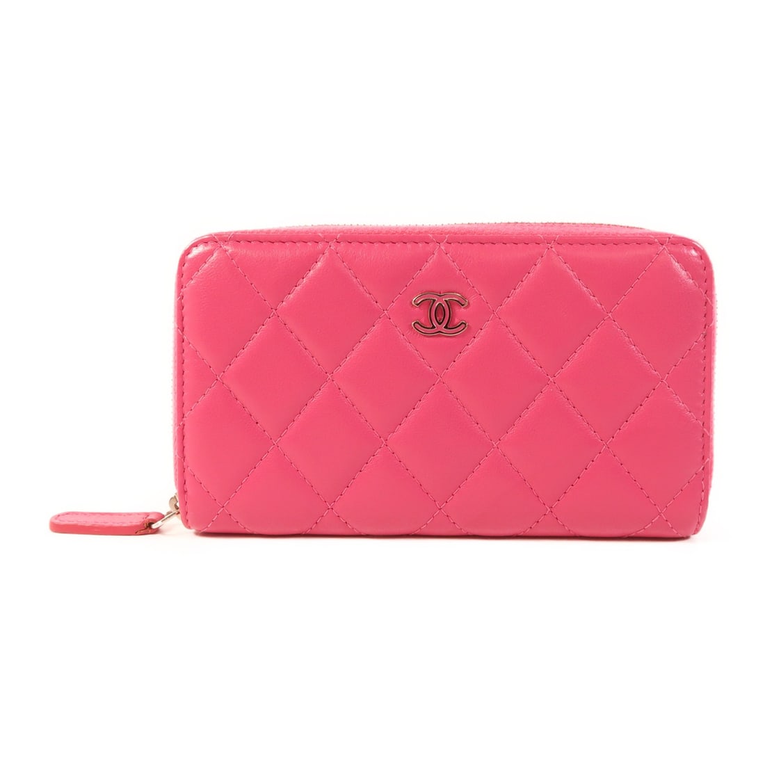 CHANEL Pink Lambskin Round Wallet with SHW: CHANEL Pink Lambskin Round Wallet with SHW This exquisite CHANEL round wallet is crafted from luxurious lambskin leather, offering a soft and supple feel. The elegant pink color enhances its chic desi