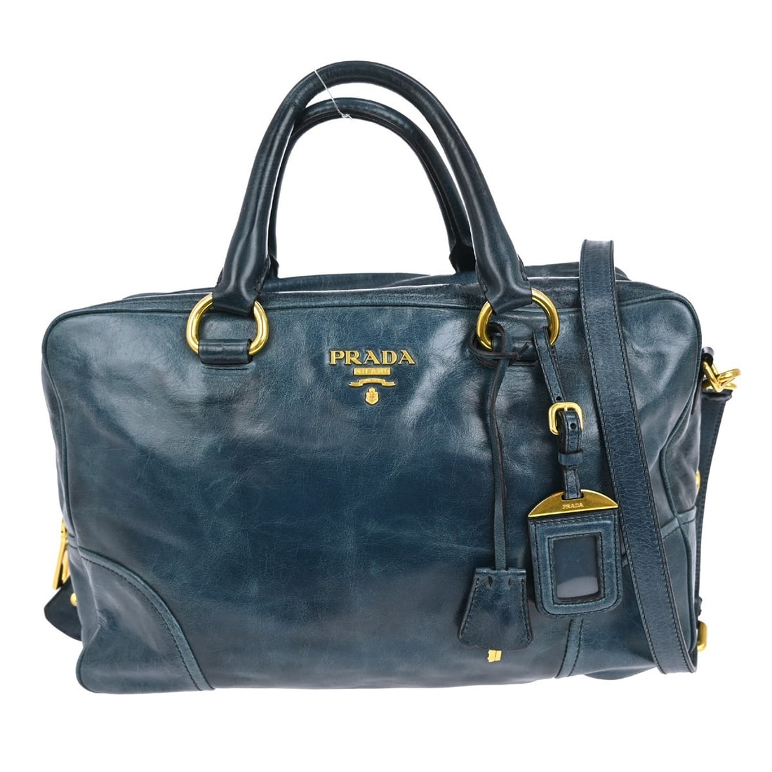 Prada Blue Leather 2way Handbag NQ02410 Top Handle: Prada Blue Leather 2way Handbag NQ02410 Top Handle This elegant Prada handbag combines style and functionality, perfect for casual occasions. Crafted from high-quality blue leather, it features a top
