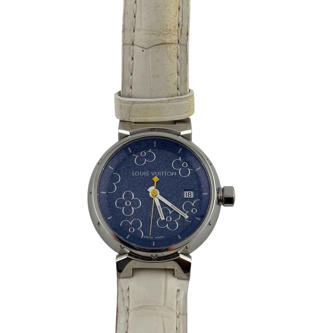 Ladies Louis Vuitton Tour Watch Purple Dial Leather Bracelet Ref Q121B: Ladies Louis Vuitton Tour Watch Purple Dial Leather Bracelet Ref Q121B This exquisite ladies' Louis Vuitton Tour watch features a striking purple dial that beautifully contrasts with its stainless ste