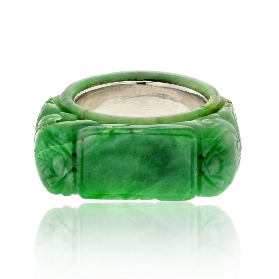 David Webb 14K White Gold Carved Jade Estate Ring: David Webb 14K White Gold Carved Jade Estate Ring This exquisite David Webb ring showcases a stunning carved jade design set in luxurious 14K white gold. With a total weight of 9.3 grams, this estate