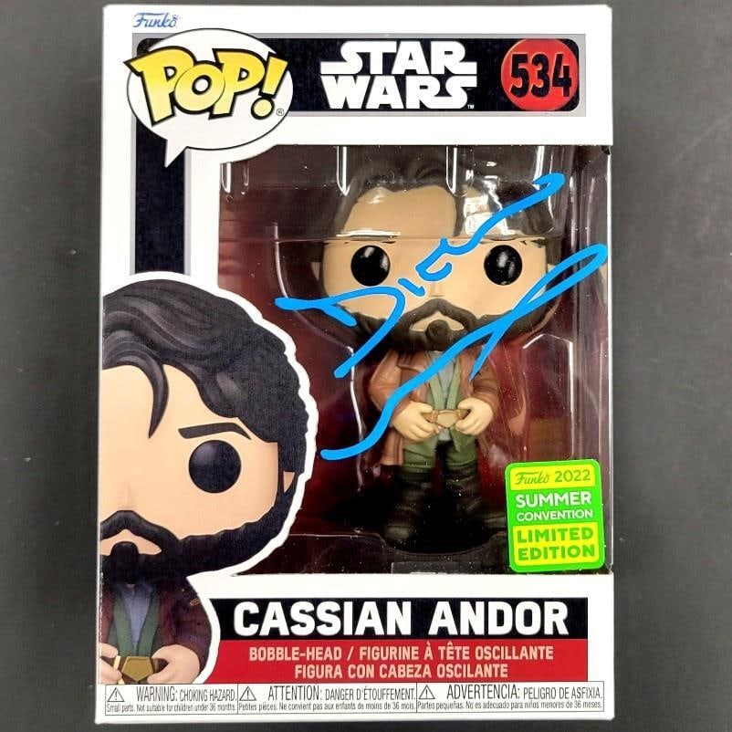Diego Luna Autographed Cassian Andor Funko Pop Star Wars Beckett Authenticated: Diego Luna Autographed Cassian Andor Funko Pop Star Wars Beckett Authenticated This is a signed Funko Pop! featuring Cassian Andor from the Star Wars franchise, autographed by Diego Luna. The item is
