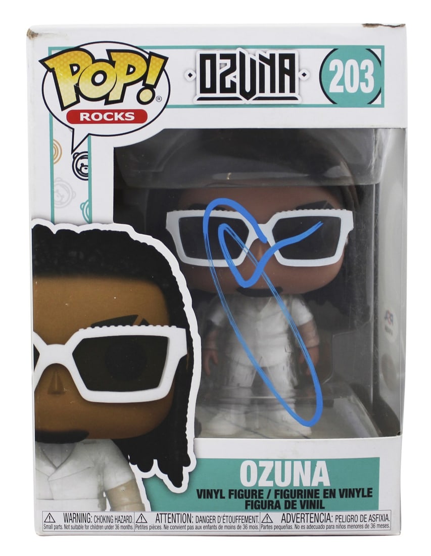 Authentic Ozuna Signed Funko Pop Vinyl Figure #203 PSA/DNA AP84504: Authentic Ozuna Signed Funko Pop Vinyl Figure #203 PSA/DNA AP84504 This Ozuna #203 Funko Pop Vinyl Figure has been personally signed by the artist Ozuna, making it a unique collectible for music fans.