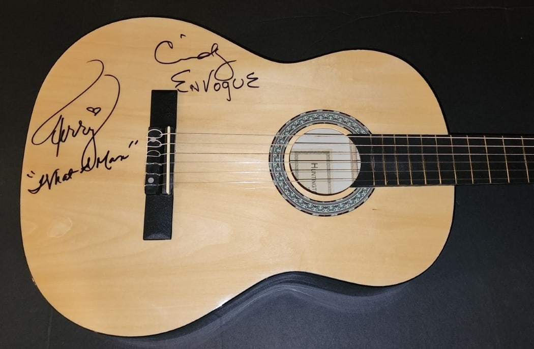 Cindy Herron Terry Ellis Signed Acoustic Guitar En Vogue JSA Authenticated: Cindy Herron Terry Ellis Signed Acoustic Guitar En Vogue JSA Authenticated Own a unique piece of music memorabilia with this Cindy Herron Terry Ellis signed acoustic guitar. This original guitar featu